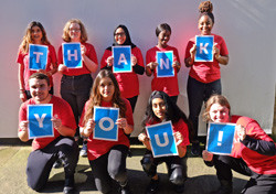 Young people holding letters spelling Thank You for National Grid virtual interview skills story