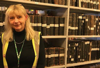 Information Records Manager Kerry Moores in the National Grid archive - used in the National Grid story 'Time travelling through the history of energy at the National Grid archive'