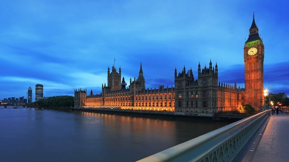 Houses of Parliament and Big Ben in London at dusk, seen from Westminster Bridge