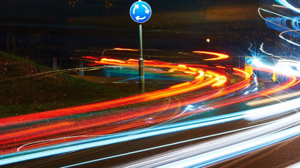 Night-time image of a busy road and traffic lights in a city - Traffic Light 