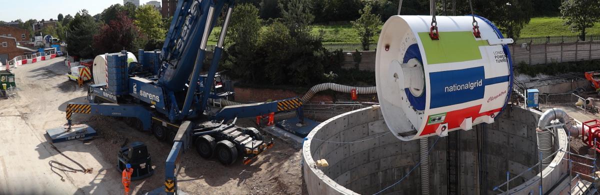 A National Grid construction site with equipment being lowered into a tunnel 
